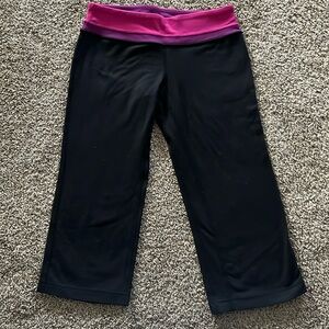 Lululemon Athletica Black/Pink Reversible Capri Crop Leggings Women’s Size 4